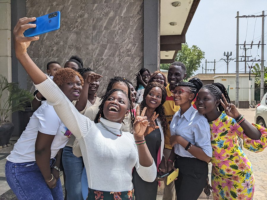 Group of girls all smiling taking a selfie
